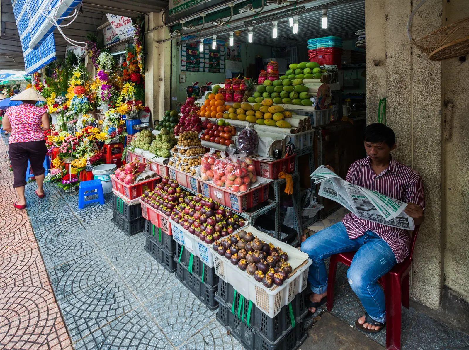 Stalls and a passage inside Ben Thanh Market in Ho Chi Minh City.