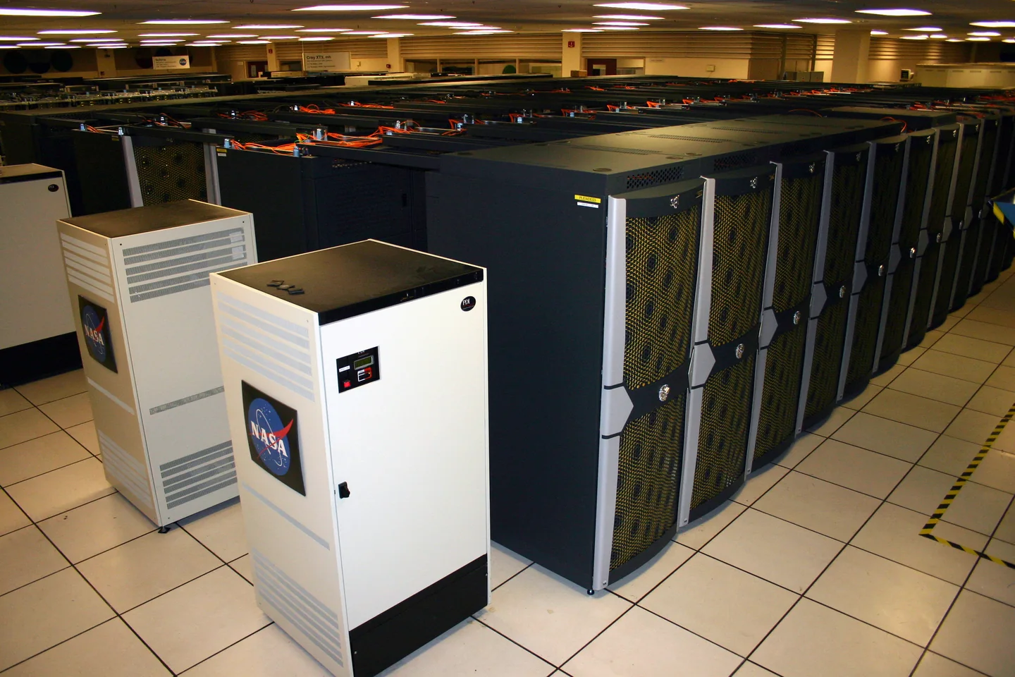 Rows of server cabinets forming the Pleiades supercomputer at NASA Ames Research Center