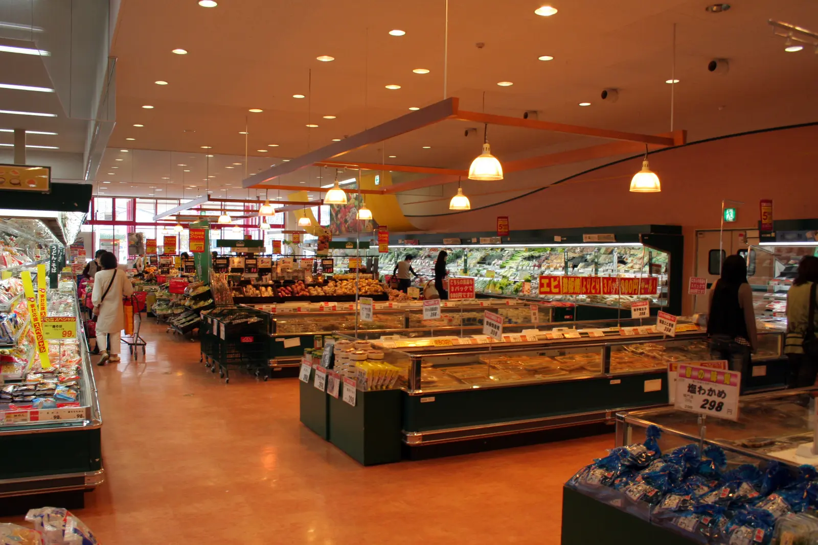Shoppers and stocked aisles inside a supermarket in Hyogo Prefecture, Japan.