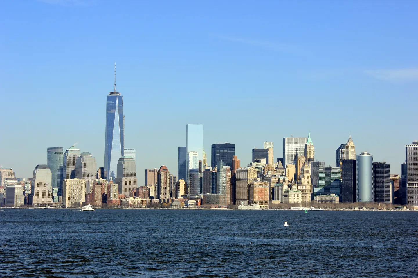 Lower Manhattan skyline and One World Trade Center seen across the water